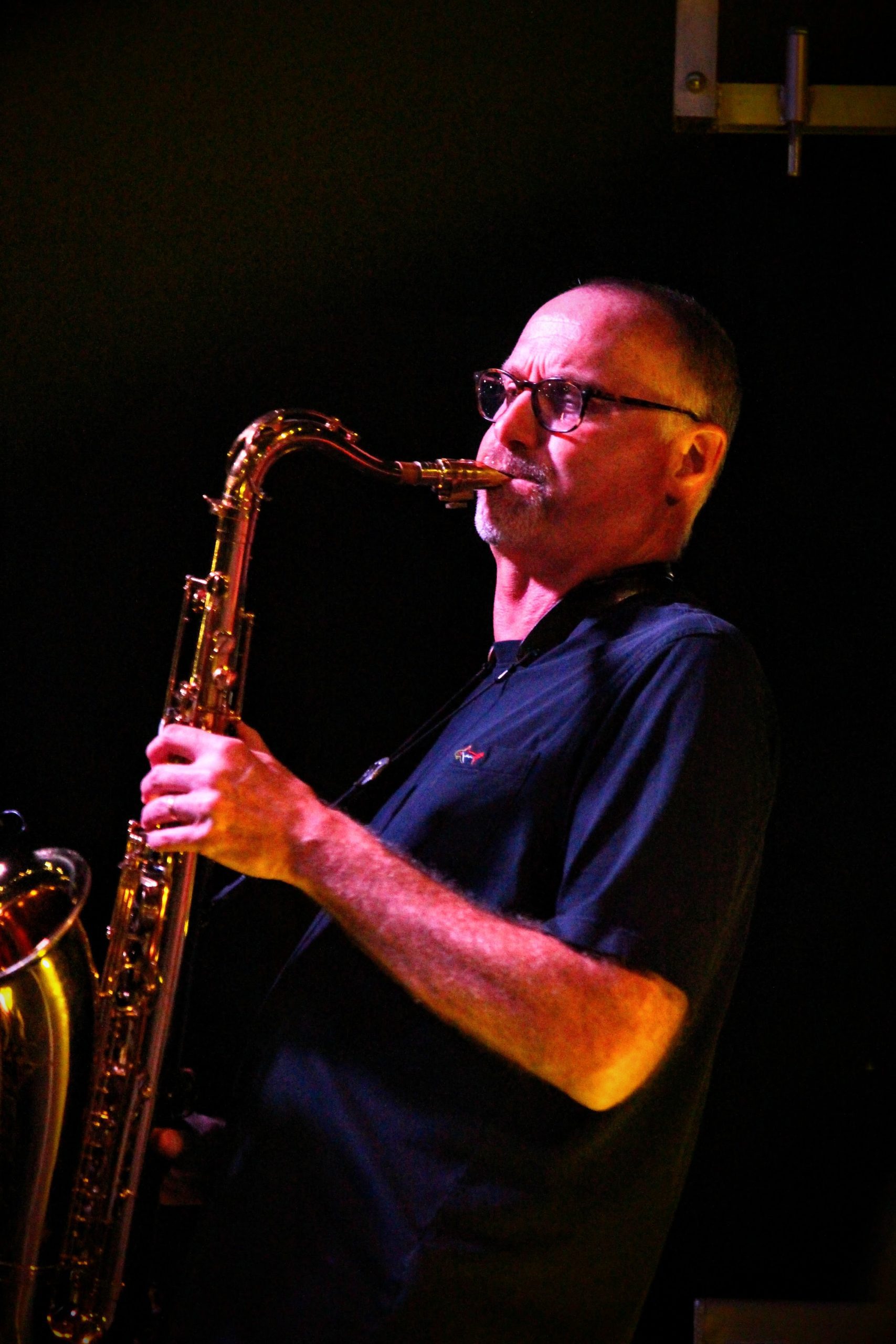 Photo of Mark Molter palying his saxophone