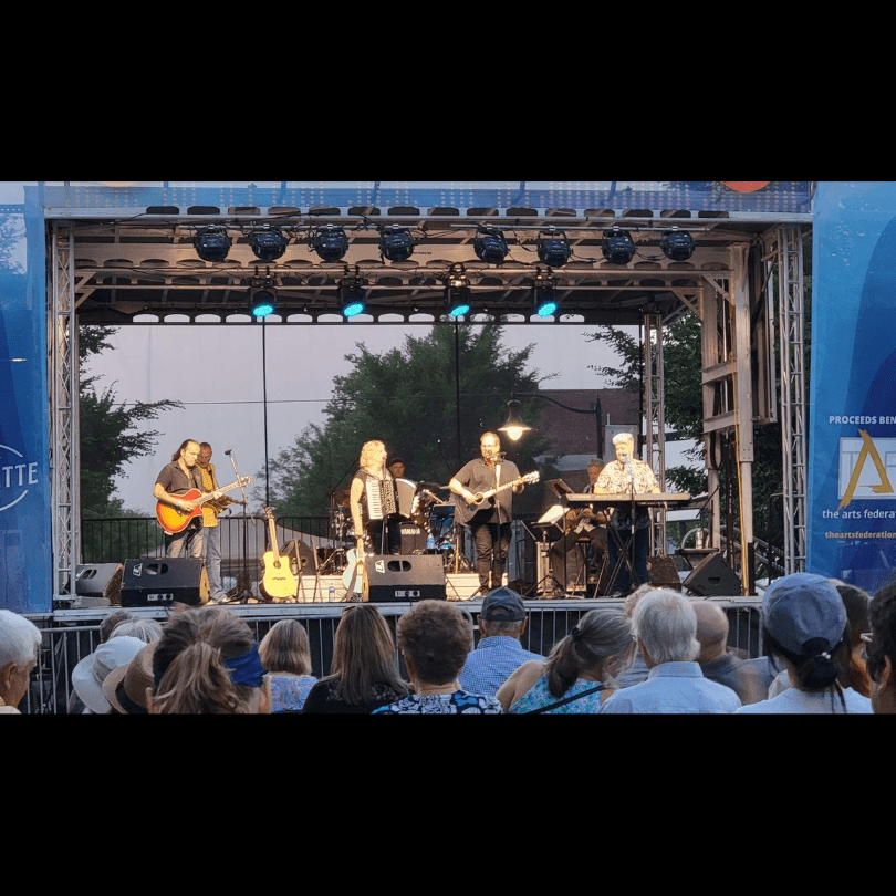 Scott Greeson with the band at Taste of Tippecanoe 2023. Vickie Maris, Lee Anna Atwell, Michael Kelsey, Stan Wallace, Mark Molter, Greg Brassie